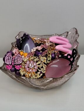 Pink Glass Dish Filled With Jewelry